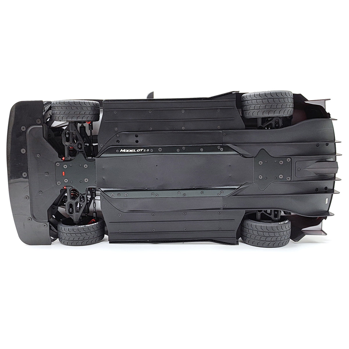 Underside of Model GT showing the flat chassis and recessed fasteners