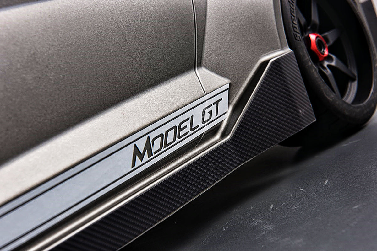 Original photograph of MODEL GT lettering along the grey side body